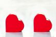 Two red hearts isolated