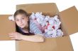 Girl in cardboard box