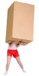 Girl holding very heavy brown cardboard box