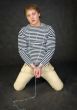 Young man shackled