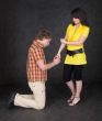Young woman to shake one`s fist at youth