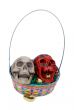 Colored skulls in an Easter basket