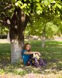 pretty woman under tree