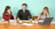 Business team sits at the table
