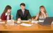 Business team sits at the table