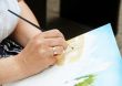 Artist painting hand