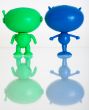 Two figures of aliens on a white