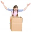 Little girl joyfully looks in a box