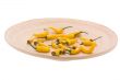 Yellow chilli in the wood plate