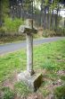 cross next to road