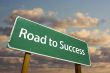 Road to Success Green Road Sign