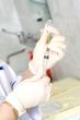 Hands with syringe and ampoule