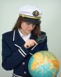 Girl - the captain examines the globe