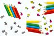 Multicolored crayons and ladybirds composition