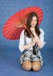 Beautiful girl with the Chinese umbrella