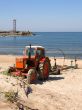 tractor at sea coast