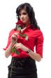 Brunette woman with red rose poses