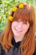 Beauty Redheaded Girl With Dandelions In Her Hair