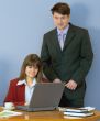 Girls at a desktop and their chief