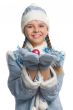 Smiling snow maiden showing christmas-tree decoration