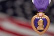 Purple Heart Against American Flag