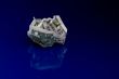 Crumpled dollar isolated on blue