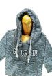 Graduate wearing grunge hoodie