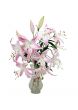 Pink and white lilies in a crystal vase