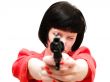 woman with pistol in red