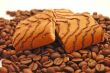 Cookies laying on coffee grains