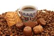 Cup of coffee with cookies and chocolates