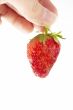 fresh strawberry in hand