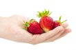 fresh strawberry in hand