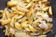 fried potatoes in griddle macro