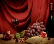  Still-life with a wine, cheese and a grapes