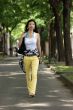 Young Asian woman walking.