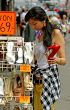 Young woman with great joy when buying shoes