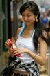 Young woman with great joy when buying shoes