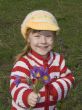 happy girl is reaching out bunch of flowers