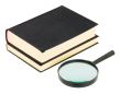 Books and magnifying glass