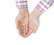 Two hands over white