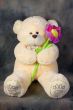 Teddy bear with flower