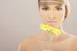 Beautiful woman with a sunflower