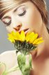 Beautiful woman with a sunflower