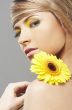 Beautiful woman with a sunflower