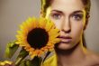 Beautiful woman with a sunflower