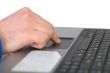 Male hand on laptop
