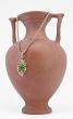 Clay jug and golden necklace