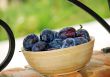 Plums wooden bowl