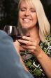 Blonde Socializing with Wine Glass